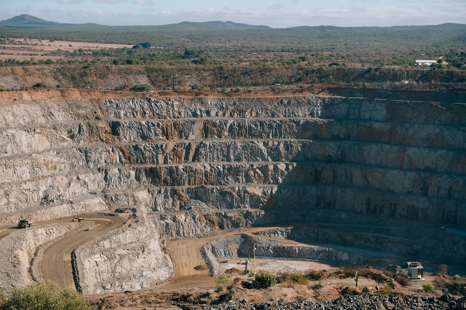 Aerial view of the Ravenswood open-cut gold mine showing terraced pit walls and mining infrastructure
